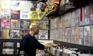 a customer browses through vinyls on Record Store Day 2018.