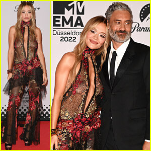 Host Rita Ora Goes Sheer On MTV Europe Music Awards 2022 Red Carpet With Husband & Co-Host Taika Waititi