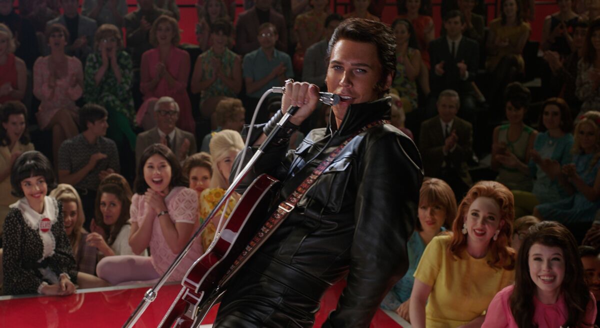 Austin Butler performs on stage in a scene from "Elvis."