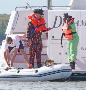 Boy George and Scarlette swapped the yacht for a dinghy
