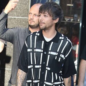 Louis Tomlinson forced to cancel album signings after breaking arm - Music News