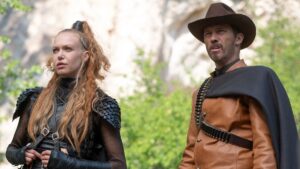 Dead sheriff Roy (Jeffrey Donovan) looks dubious as he and his more experienced, black-leather-clad ghost-hunter partner Jeanne (Penelope Mitchell) look at something offscreen in RIPD 2: Rise of the Damned