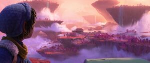 in a scene from Strange World, a teenage boy looks out at a wondrous landscape, where everything is pink, orange, and red; there are floating rockscapes and clouds covering them