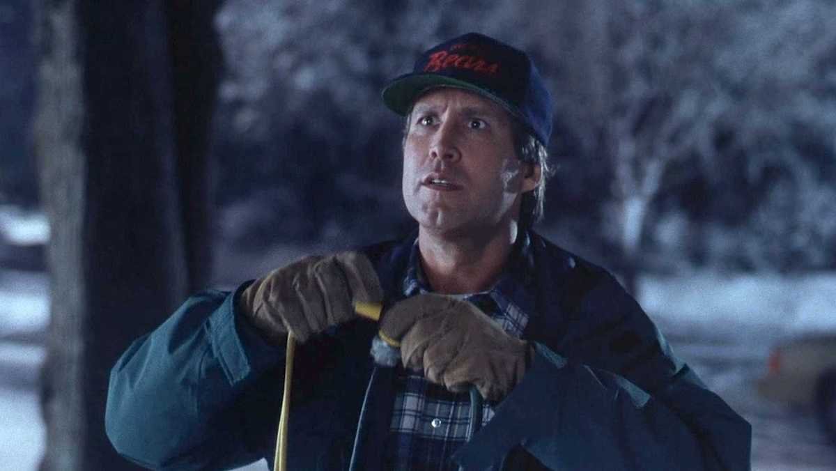 photo of clark griswold plugging up christmas lights national lampoon classic movie