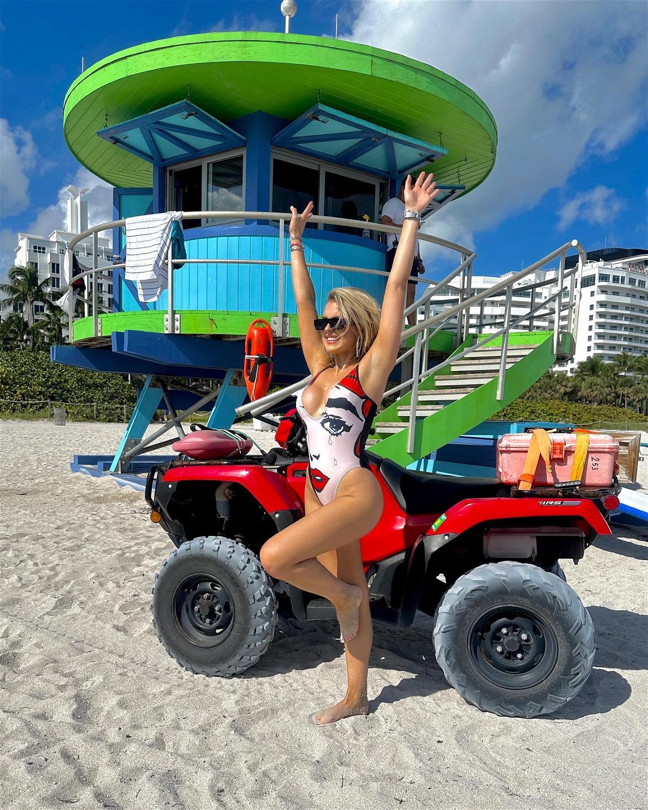 Tallia Storm brings a plunging swimsuit to the beaches of Miami