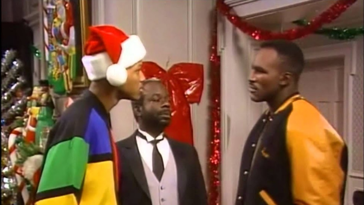 The Fresh Prince of Bel-Air Will Smith and Evander Holyfield stand face to face
