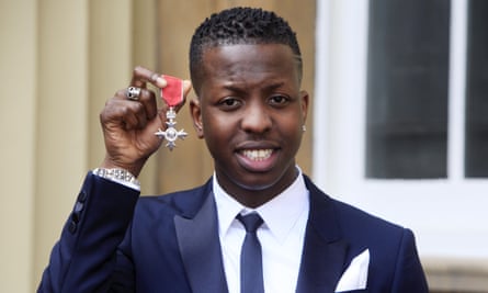 Jamal Edwards being awarded his CBE for services to music at Buckingham Palace in 2015.