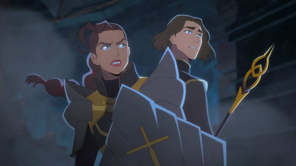 in a scene from the animated series Dragon Age: Absolution, a woman in armor (Tassia) stands back-to-back with a long-haired man wielding a staff (Rezaren)