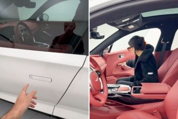 Everyone’s distracted by the passenger door during Aston Martin family test