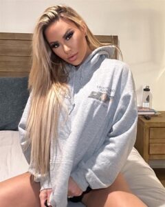Kindly Myers in a hoodie