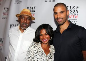 Nia Long (center), her father Doughtry "Doc" Long (left) and Ime Udoka in 2012.