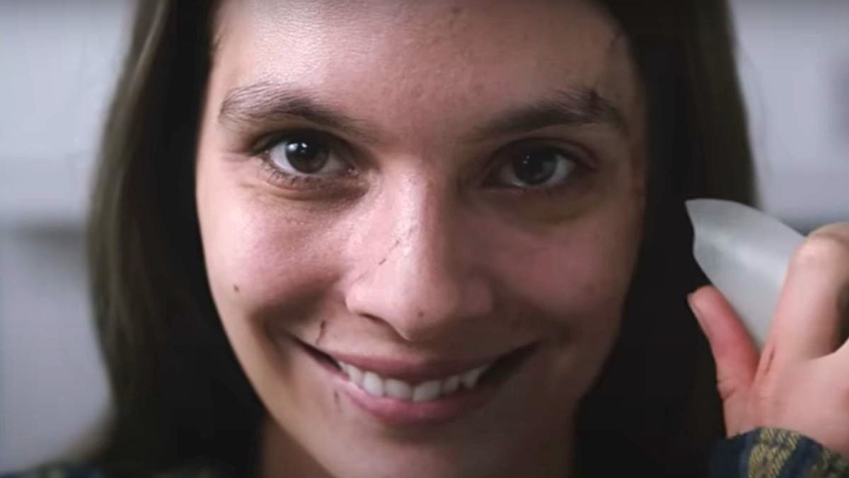 close up photo of a woman smiling in smile trailer