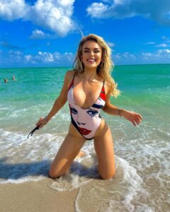 Tallia Storm brings a plunging swimsuit to the beaches of Miami