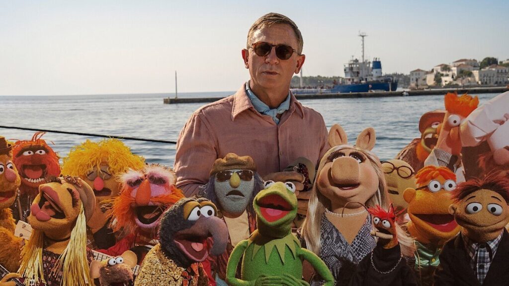 Benoit Blanc in Glass Onion with many of the Muppets