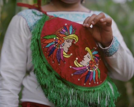 Yolanda Morales shows her cruzado, the front part of the voladores’ costume 