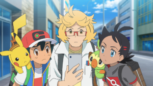 An image of Ash, Goh, and another character leaning over and looking curiously at a phone.