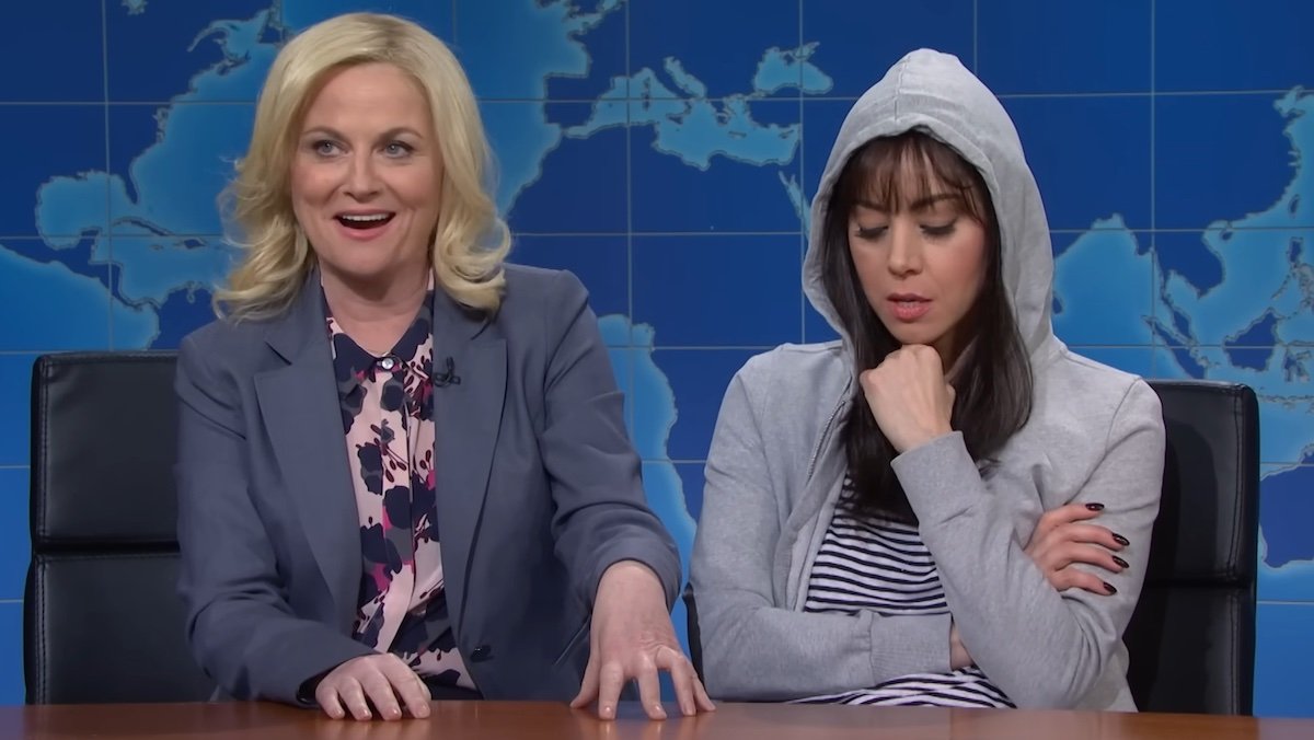 Amy Poehler and Aubrey Plaze as their PArks and Rec characters Leslie and April appear on SNL's Weekend Update together