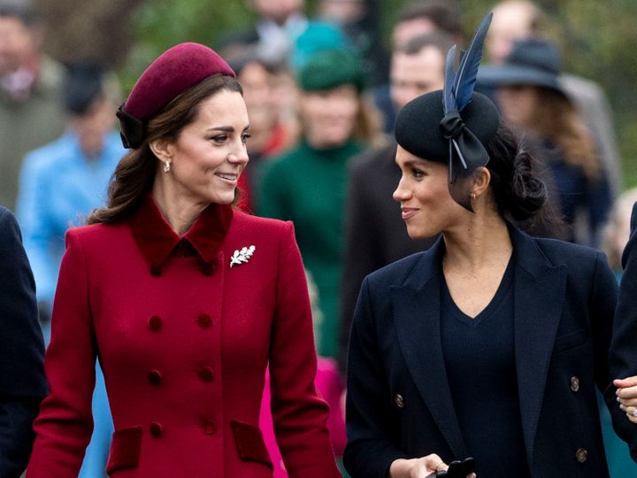 Kate Middleton, now Princess of Wales, and Meghan Markle, Duchess of Sussex, attend church service on the Sandringham estate on Dec. 25, 2018, in King's Lynn, England.