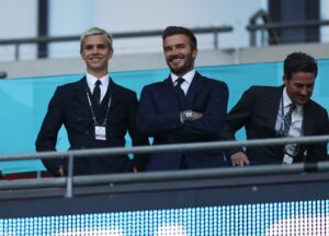 LONDON, ENGLAND - JUNE 18: Romeo Beckham and David Beckham, Former England International react as they watch on from the stands during the UEFA Euro 2020 Championship Group D match between England and Scotland at Wembley Stadium on June 18, 2021 in London, England. (Photo by Eddie Keogh - The FA/The FA via Getty Images)