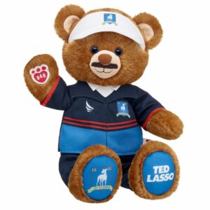 Build-A-Bear's Ted Lasso Plush doll sitting and waving