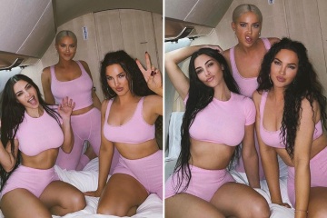 Kim flashes her toned abs and shrinking waist in a pink crop top & tiny shorts
