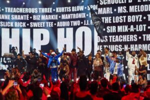 An array of hip-hop stars onstage at an awards show