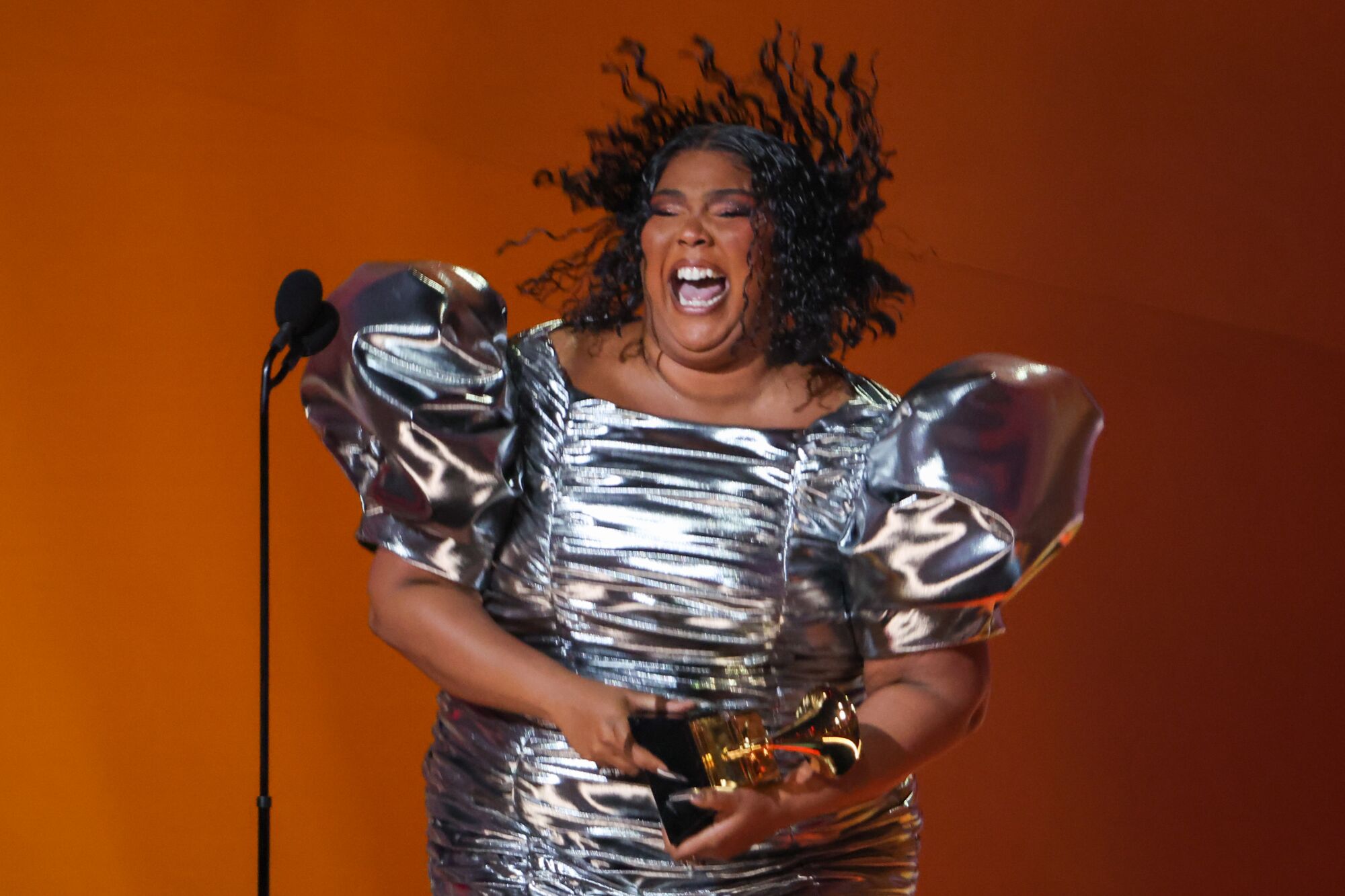 Lizzo accepts the award for record of the year at the 65th Grammy Awards, held at the Crytpo.com Arena.