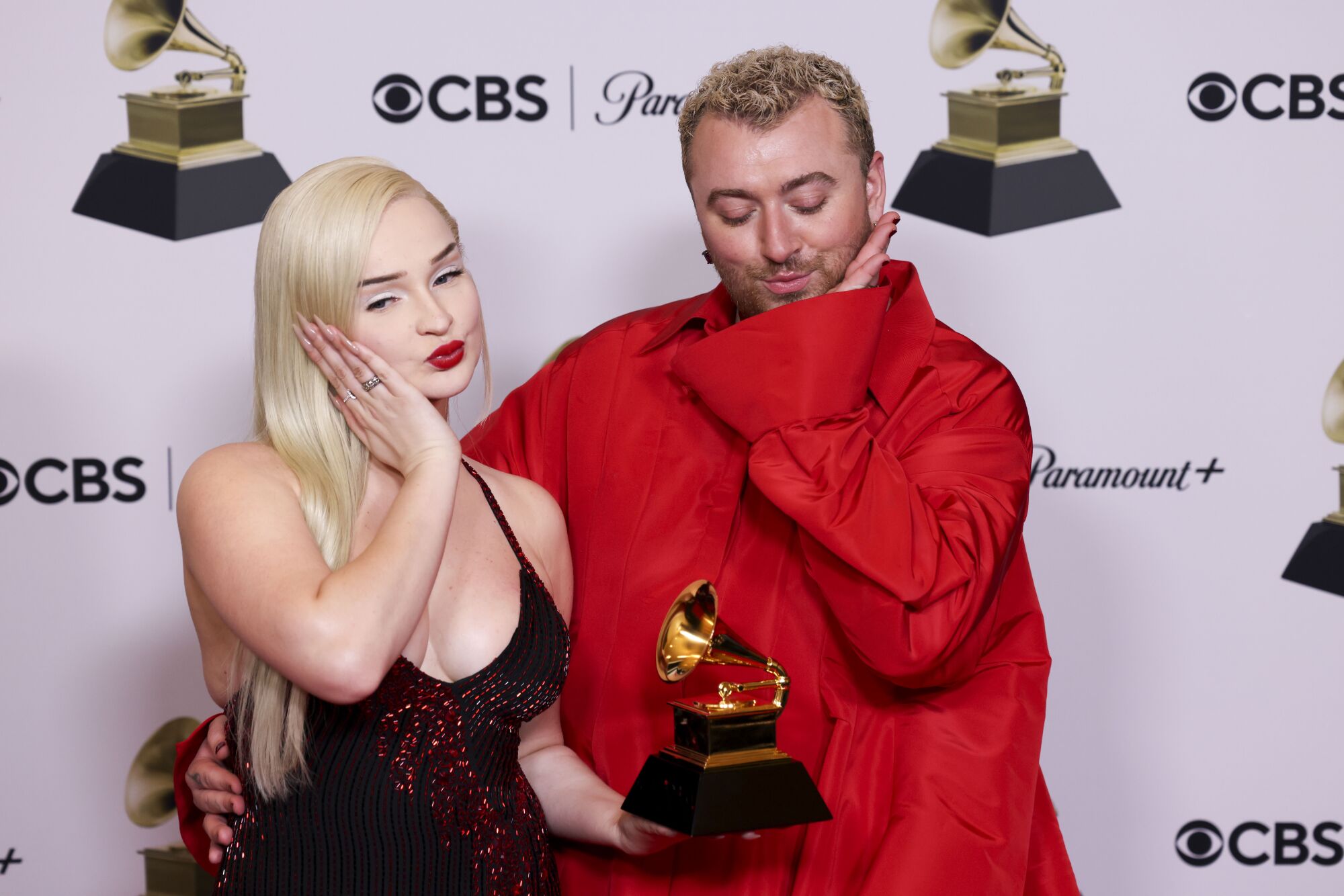 Kim Petras and Sam Smith stand with their trophy at the 65th Grammy Awards 
