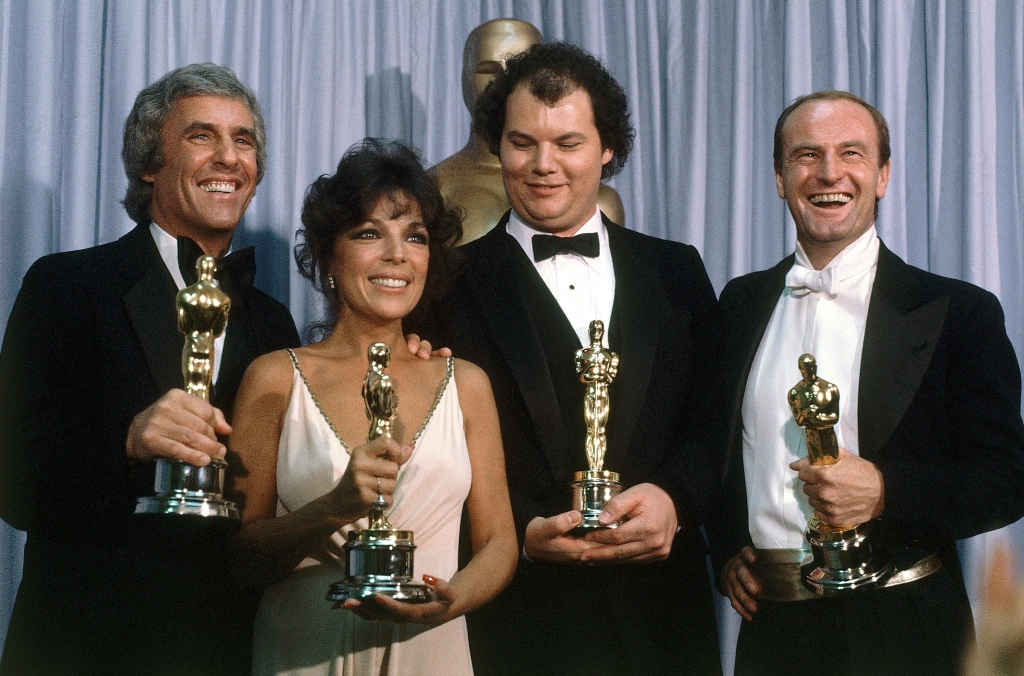 Burt Bacharach, Carole Bayer Sager, Christopher Cross and Peter Allen, winners of the Oscar for best original song "Arthur's Theme (Best That You Can Do)" at the 54th Annual Academy Awards in Los Angeles on March 29, 1982.