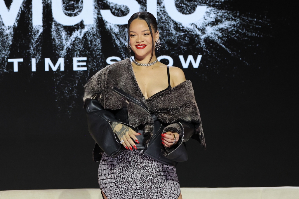 A beaming Rihanna attended a press conference for the halftime show on Thursday in Phoenix.