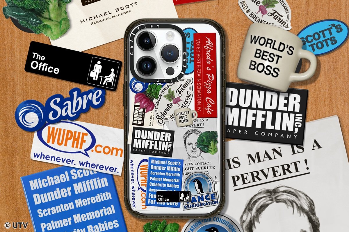 Back of a smartphone with an The Office themed CASETify case surrounded by other items from the show