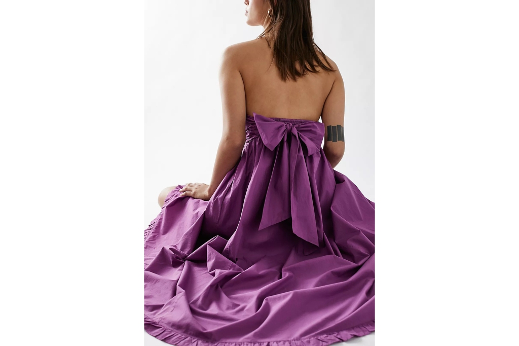 A woman in a purple dress