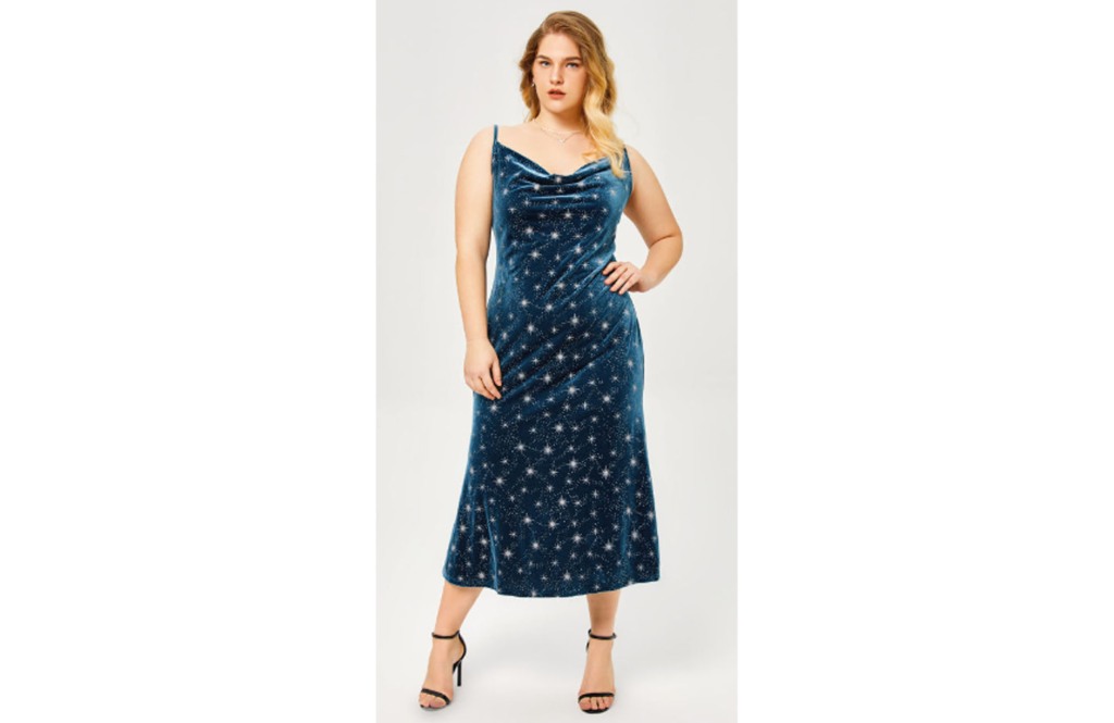 woman wearing a navy blue star pattern maxi dress