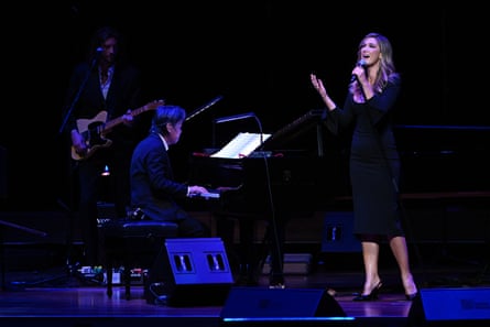 Delta Goodrem performs a medley to finish the service.