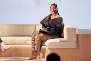 In Phoenix, Rihanna speaks during the Super Bowl LVII Pregame and Apple Music Halftime Show press conference on Feb. 2023.