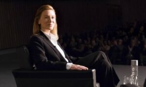 ‘In many ways Lydia Tár perpetuates the masculine conductor trope: she wears tailored power suits; speaks in a low voice; drives fast cars …’ Cate Blanchett as Tár.