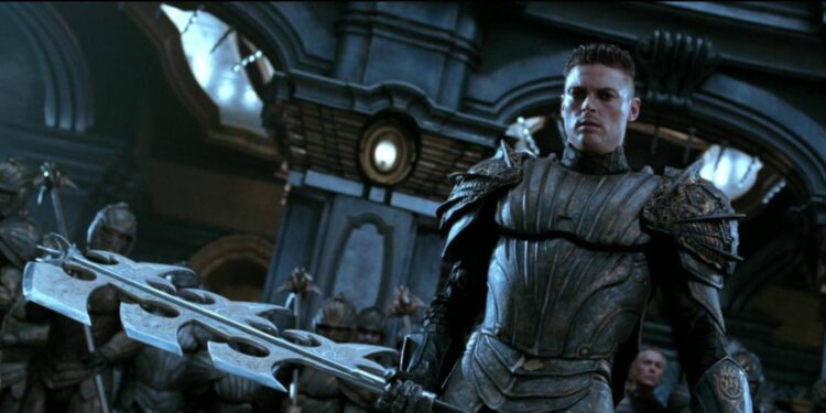 Vaako, with his triple-bladed axe, in The Chronicles of Riddick.