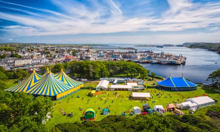 Festival site with big tents near harbour