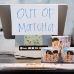 The cash register with cupsleeves on display during a cupsleeve event at R&B Tea.