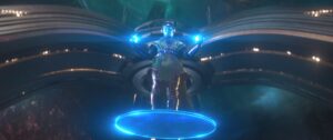 Kang, lit up blue, hovers down from his station in the Quantum Realm in Ant-Man and the Wasp: Quantumania