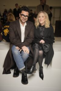 PARIS, FRANCE - MARCH 03: Dan Levy and Catherine O'Hara at Loewe Fall 2023 Ready To Wear Runway Show on March 3, 2023 at Chateau de Vincennes in Paris, France. (Photo by Swan Gallet/WWD via Getty Images)