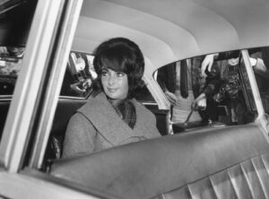 Elizabeth Taylor in a car in London in 1960