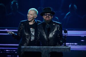 Annie Lennox (left) and David Stewart (right) of Eurythmics speak on stage during the 37th Annual Rock & Roll Hall Of Fame Induction Ceremony.