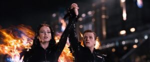 katniss and peeta on fire in the first hunger games movie