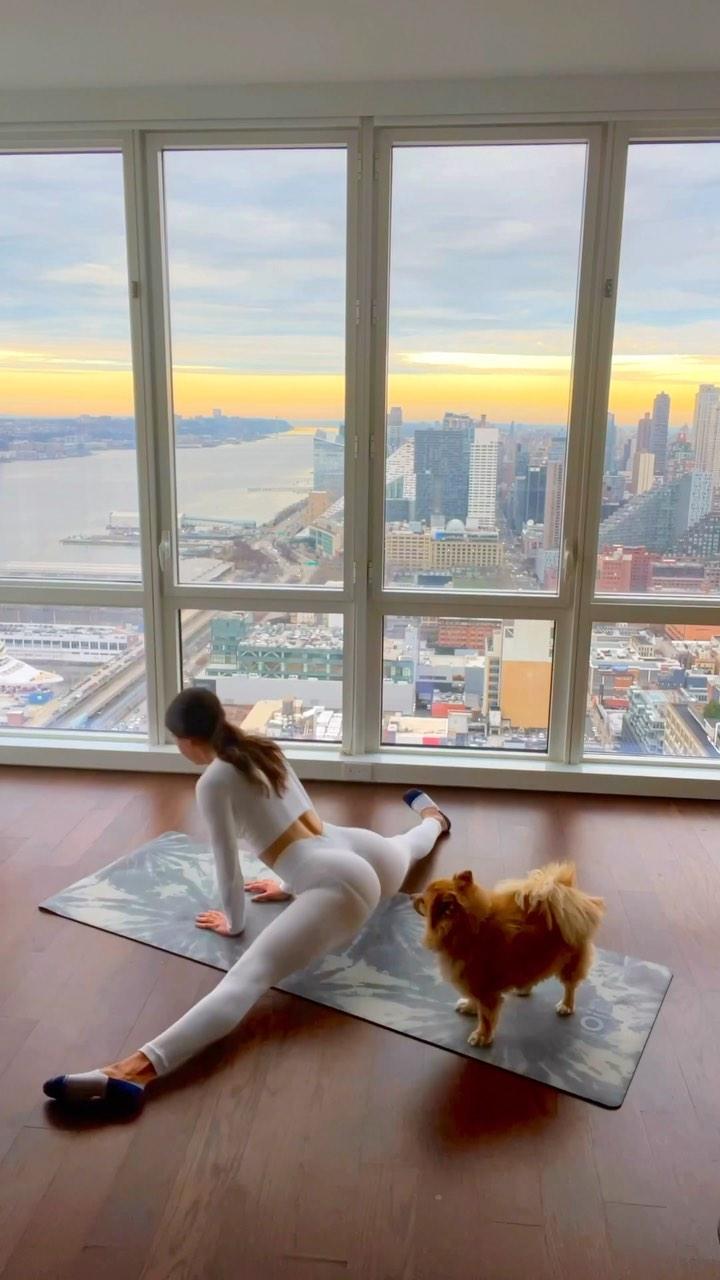 Jen Selter stretches with Gram chewing on her hair 