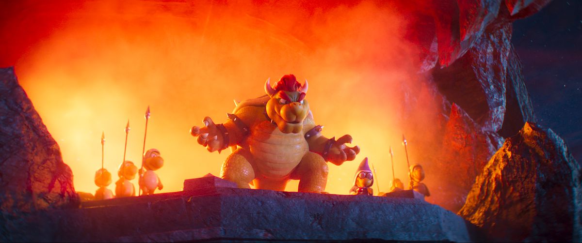 Bowser (Jack Black) standing on a cliff with soldiers looking menacing