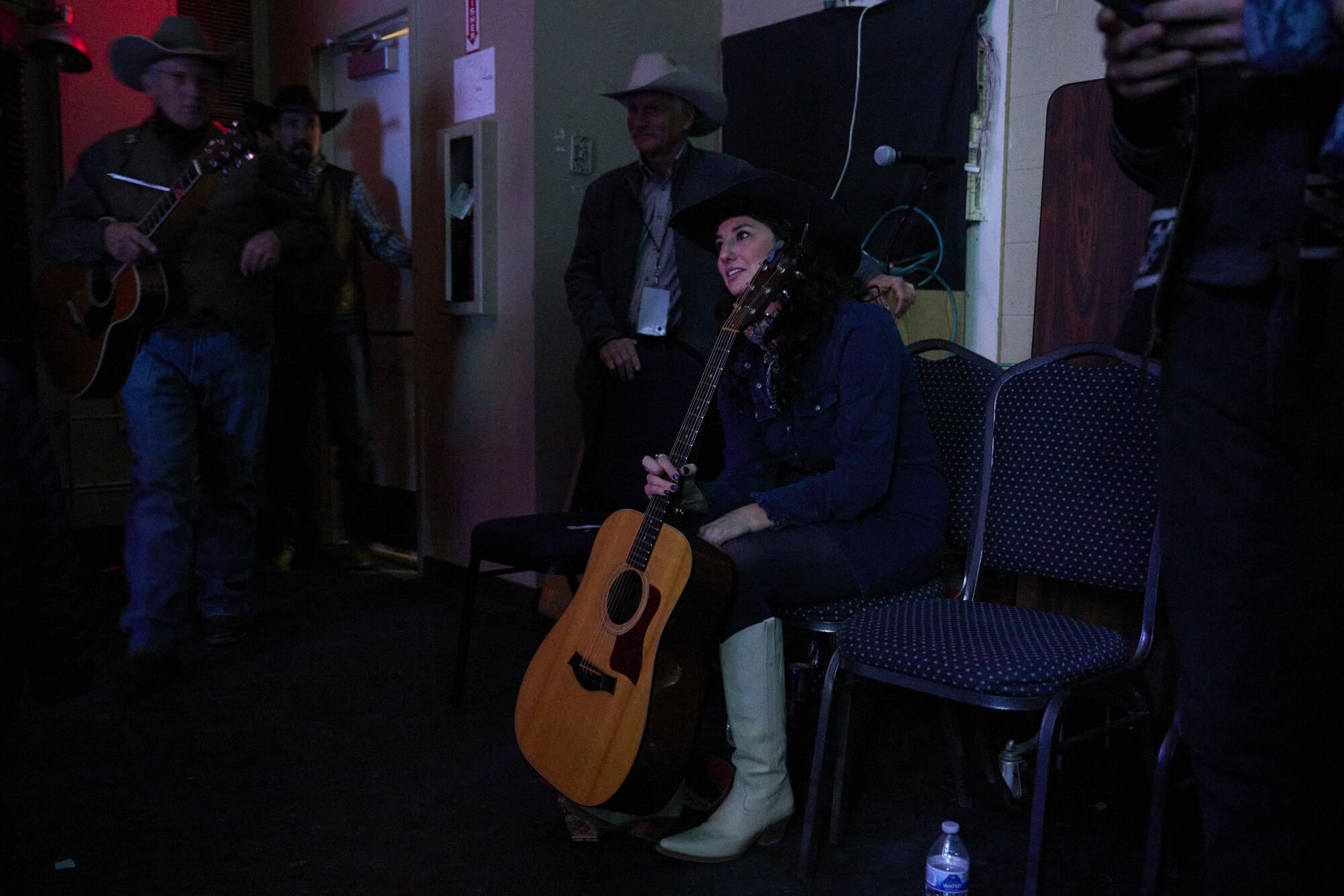 Jessie Veeder waits backstage prior to performing during the National Cowboy Poetry Gathering.