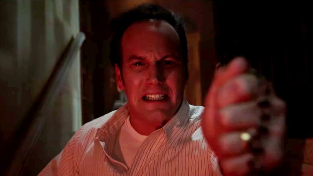 Patrick Wilson fights evil as Ed Warren in The Conjuring: The Devil Made Me Do It.
