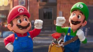 Mario and Luigi raise their arms in triumph in The Super Mario Bros. Movie