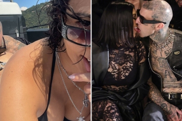Kourtney busts out of NSFW G-string bikini as Travis bites her bare butt